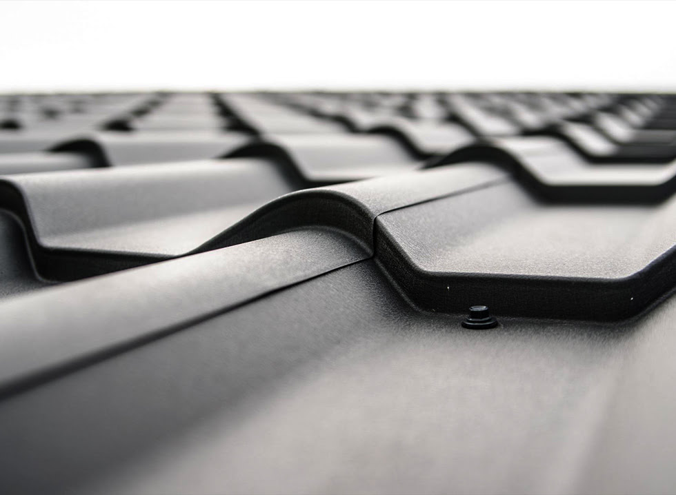 Metal shingles on roof with visible connector