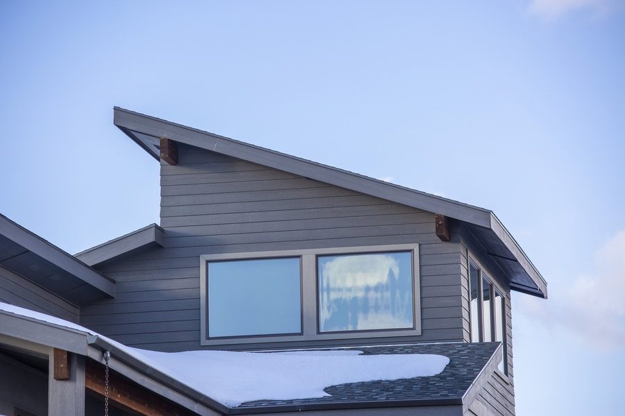 Hardie board siding on Calgary home during winter