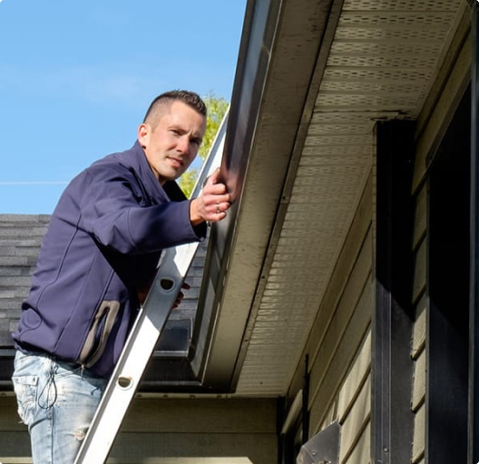Grey rooftop shingles covering a newly constructed home